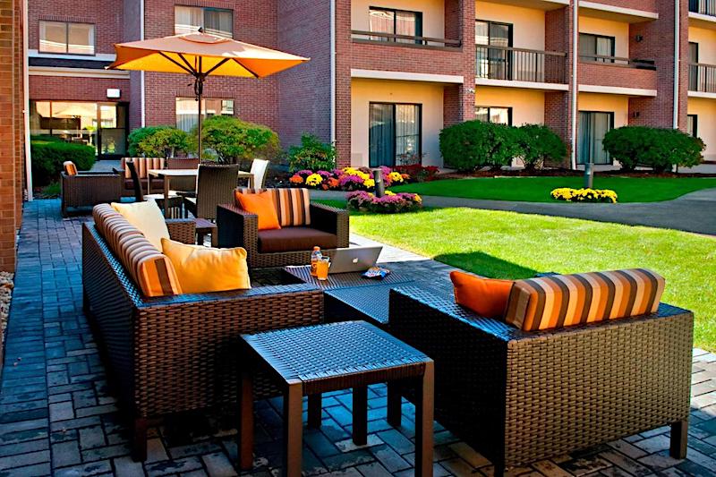 Patio seating at Sonesta Select Hotel Boston Foxborough