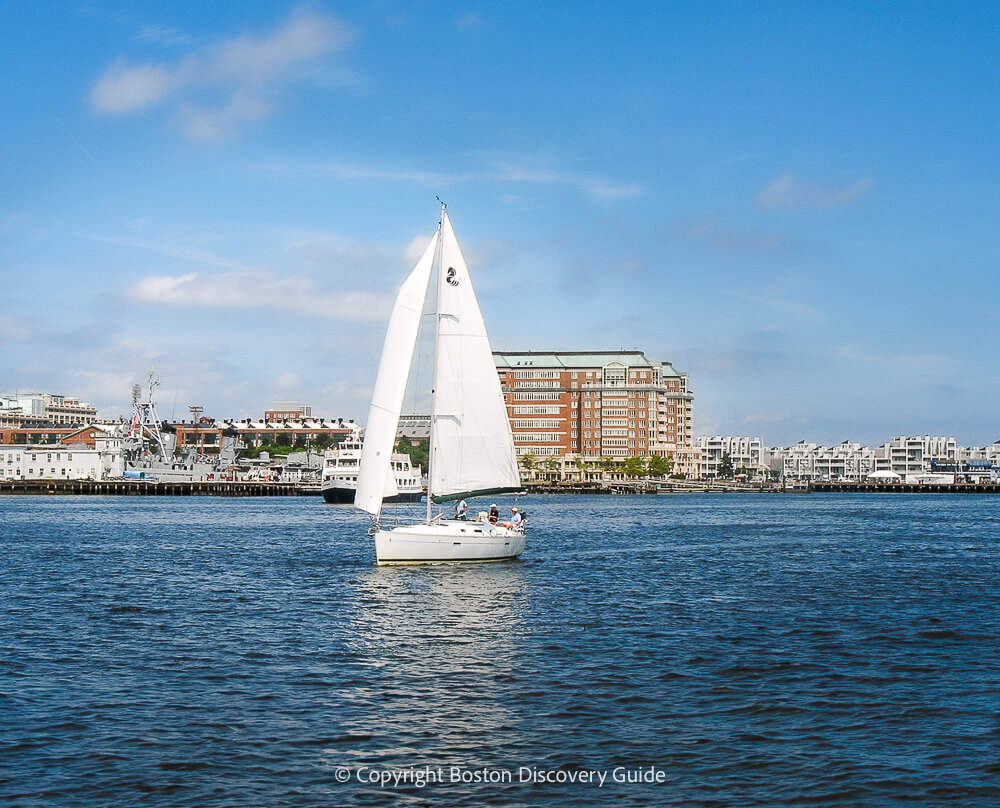 Sailboat seen from Harborwalk on Boston's Downtown Waterfront