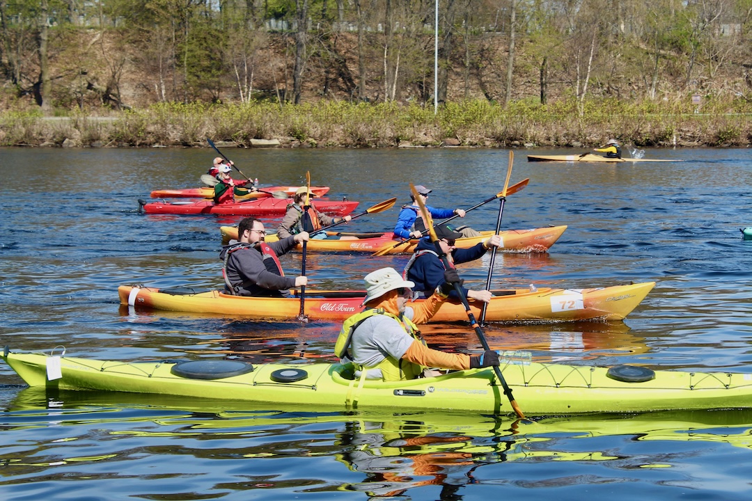 Kayak racer competing in the Run of the Charles - Photo courtesy of Charles River Watershed Association & Jamie Doucett Photo