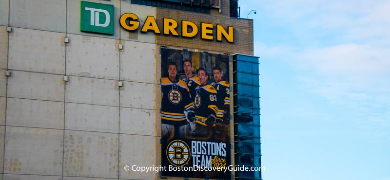 Bruins walk through the crowds to get to the TD Garden